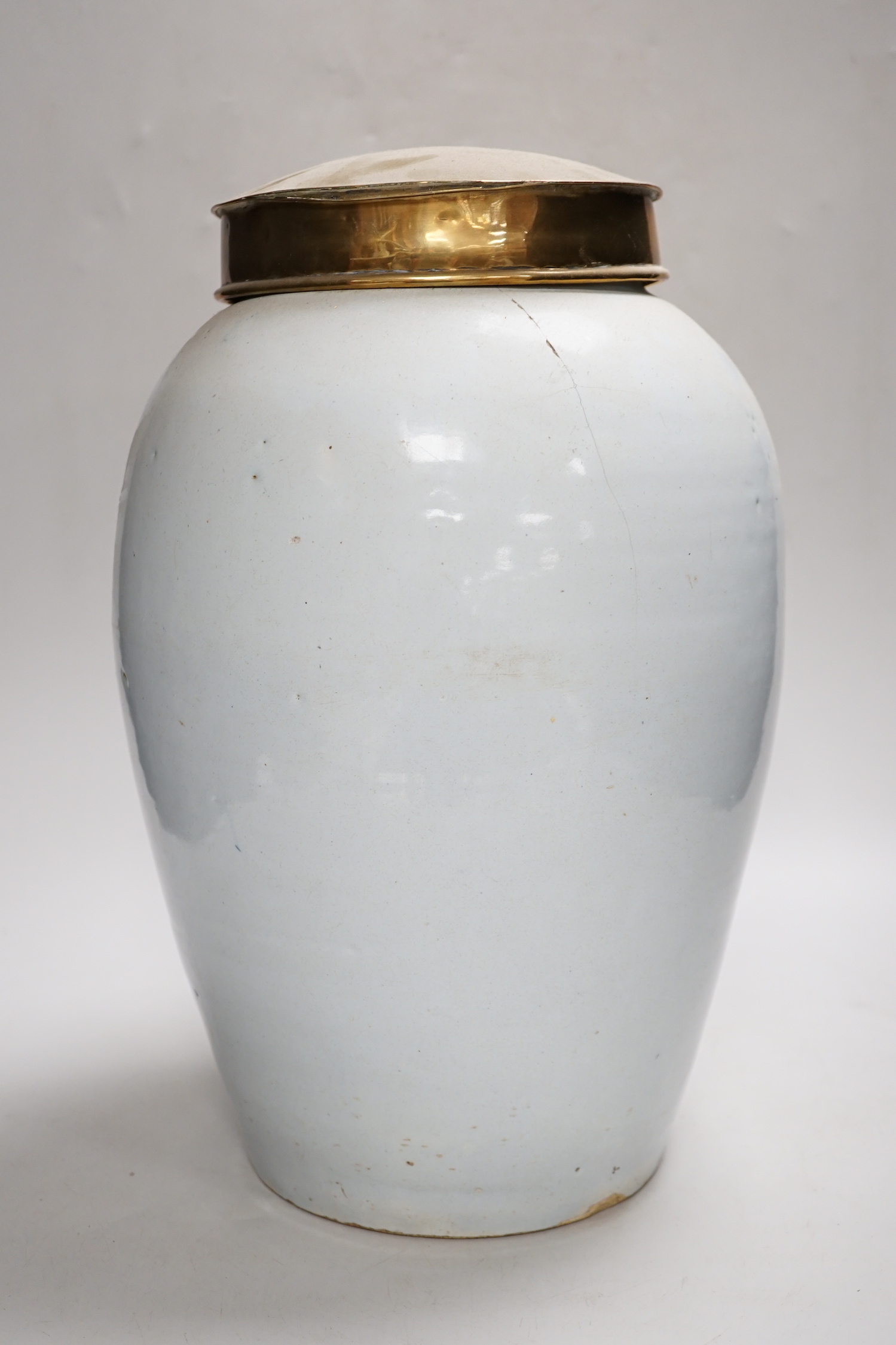 A mid 18th century Delft tobacco jar and brass cover, 36cm